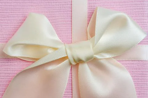 Blue gift on a purple background Stock Photos