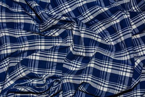 Blue gingham tablecloth background or texture . Stock Photos