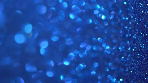 Blue Glitter Background. Magic dust, shiny texture, holiday lights, flying Stock Footage 167194577
