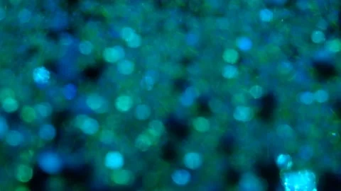 Blue glitter background in slow motion. Stock Footage 239416175