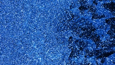 Blue Glitter Particle Flow Background with Shimmering Sparkles and Dynamic Stock-Footage 335893845