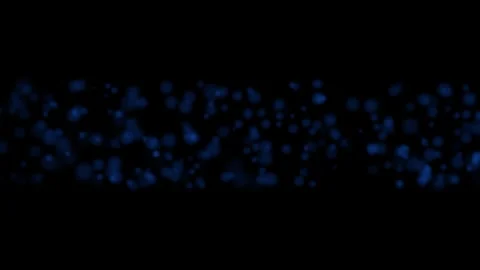 Blue glitter particles floating in air video. Realistic glowing blurred Stock Footage 289091837
