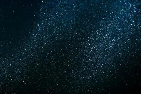 Blue glitter particles Stock Photos