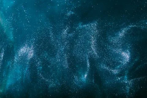Blue glitter particles Stock Photos