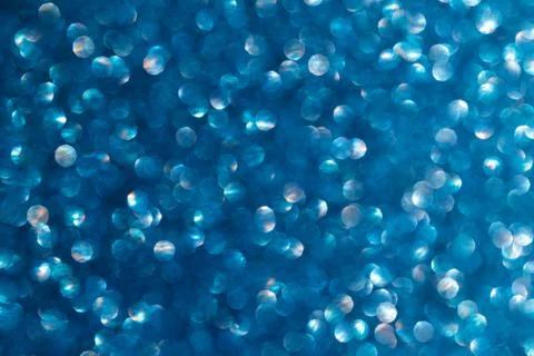 Blue glitter texture holidays background. Macro shot Stock Photos