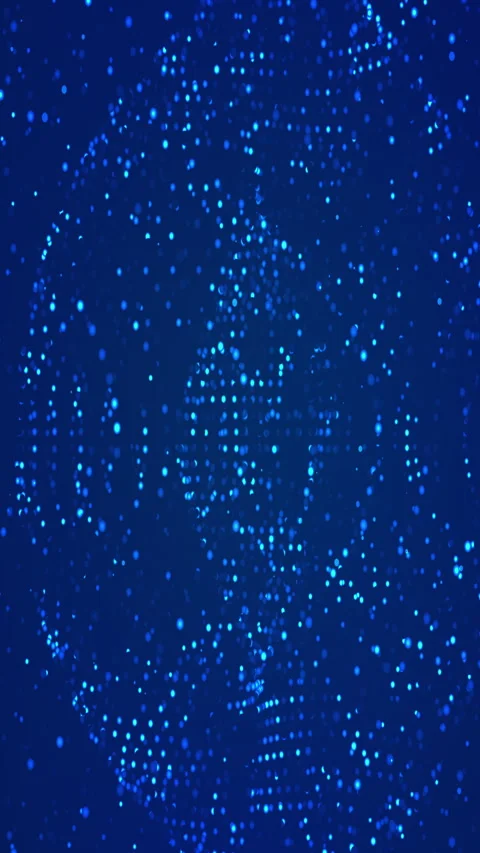 Blue glittering particles densely populate a dark blue background. 스톡 동영상 300246360