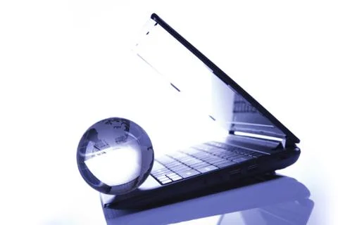 Blue Globe and Computer Keyboard Stock Photos