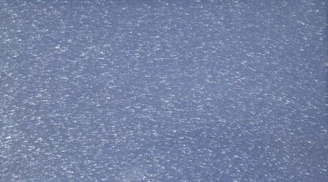 Blue glossy plain background. Metallic. Texture. Close-up shot. Stock Photos