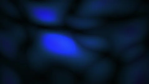 Blue glowing cells or microorganisms under microscope. 스톡 동영상 335945779