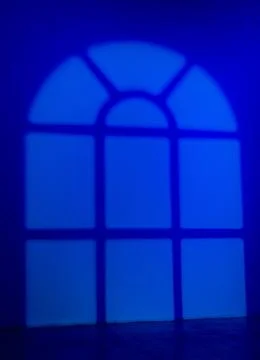 Blue gobo window light pattern on wall Stock Photos