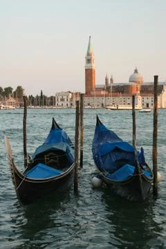 Blue gondolas in Venice on the joke. Stock Photos