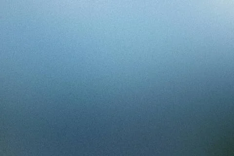 Blue gradient background with a subtle grain texture, ideal for design pro... Stock Photos