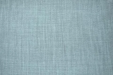Blue gray background fabric texture. A piece of woolen cloth is neatly laid o Stock Photos