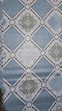 Blue gray geometric botanical pattern floor mat gathering. Stock Photos