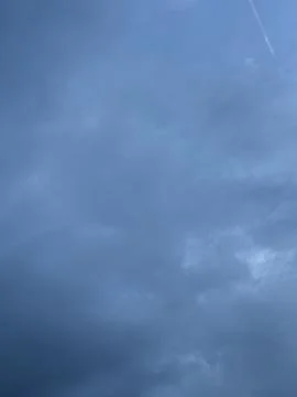 Blue Gray Sky with Hazy Cloud Pattern Stock Photos