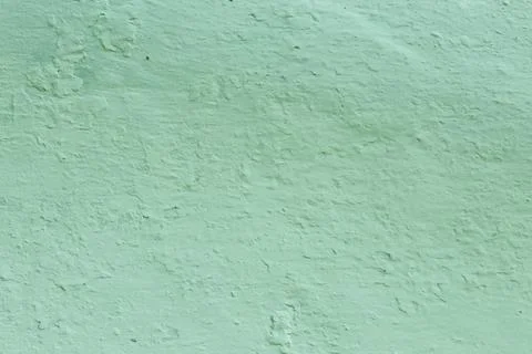 Blue-green plaster on the wall. Stock Photos