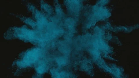 Blue Green powder exploding on black background in super slow motion, shot with Stock Footage 84300270