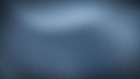 Blue grey gradient abstract background with grainy texture and smooth blur .. Stock Photos