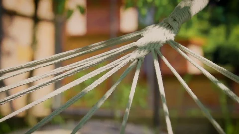 Blue hammock swinging slow motion Stock Footage 106808877