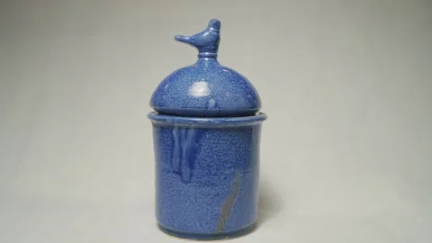 Blue handmade clay tableware on a white background Video stock 312201769