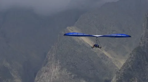 Blue hang glider Stock Footage 63371713