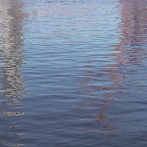 Blue harbor water with painterly reflections, square background Видео 333327493