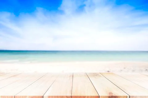 Blue hat over blue tower on the beach , sand , ocean and blue sky background. Stock Photos