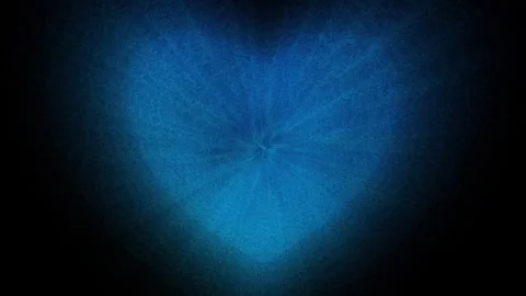 Blue heart made of small particles on a black Stock Footage 263615533