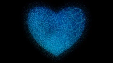 Blue heart made of small particles on a black background. Stockbeeldmateriaal 264885875