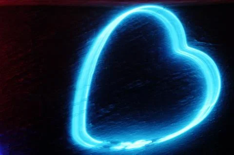 Blue heart shaped neon light illuminating the interior of a modern pub イラスト素材