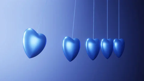 Blue Hearts in Newton's Cradle Loop. Ideal for Valentine's Day Stock Footage 229459073