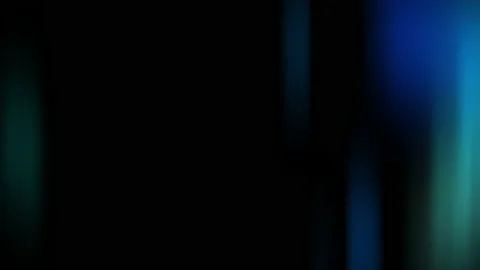 Blue highlights on a black background vertical. Light Leaks 4K footage. Lens Stock Footage 142084044