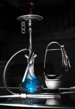 Blue hookah placed on the table Stock Photos