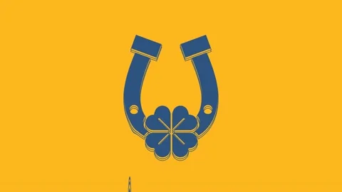 Blue Horseshoe with four leaf clover icon isolated on orange background. Happy Stock Footage 234297478