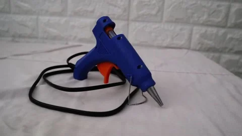Blue hot glue gun Stock Footage 294268146