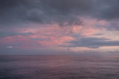 Blue hour with clouds of different colors. Stock Photos