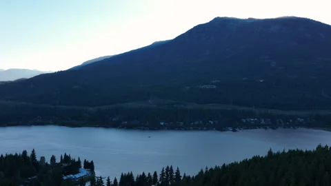 Blue Hour Drone Shot of Alta Lake and Mountain Silhouette, Whistler BC Stock Footage 329946423