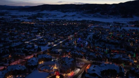 Blue hour drone view of a winter resort resembling Breckenridge, Colorado Stock Footage 346771187