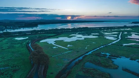 Blue Hour in Hyperlapse over Wetlands and meadows in RSPB Exminster Marshe, UK 動画素材 222563062