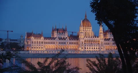 Blue hour light over lighted parliament in Budapest 4K video 動画素材 259919265