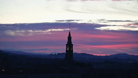 Blue hour sunset with red clouds with old building Stock Footage 231569920