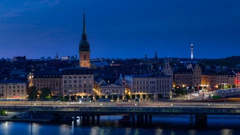 Blue hour Sunset time lapse of traffic over Gamla Stan island in Stockholm Stock Footage 95981103
