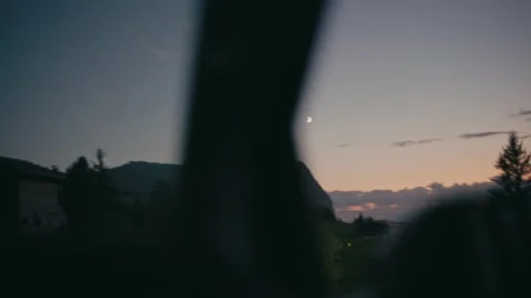 Blue Hour Twilight Landscape Featuring Mountain Peaks and a Crescent Moon Stock-Footage 331164238