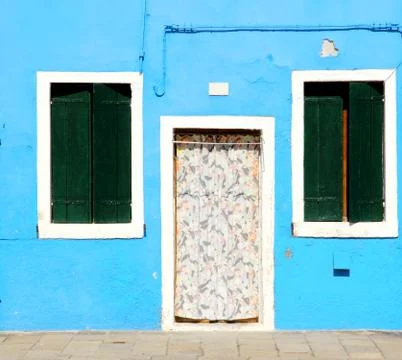 Blue house with closed windows as background Stock Photos