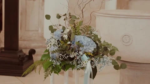 Blue Hydrangea Wedding Floral Arrangement on Church Pedestal 스톡 동영상 343697412