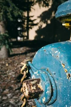Blue hydrant with flaking paint Stock Photos