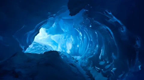 Blue Ice cave. Slow motion 4K footage Stock Footage