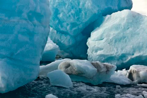 Blue ice rocks split from 1500 year old glacier Stock Photos