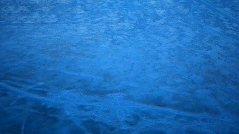 Blue ice surface over the river in the light of the setting sun Stock Footage 106063574