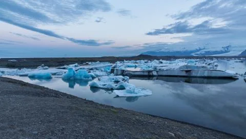 Blue icebergs floating Stock Photos
